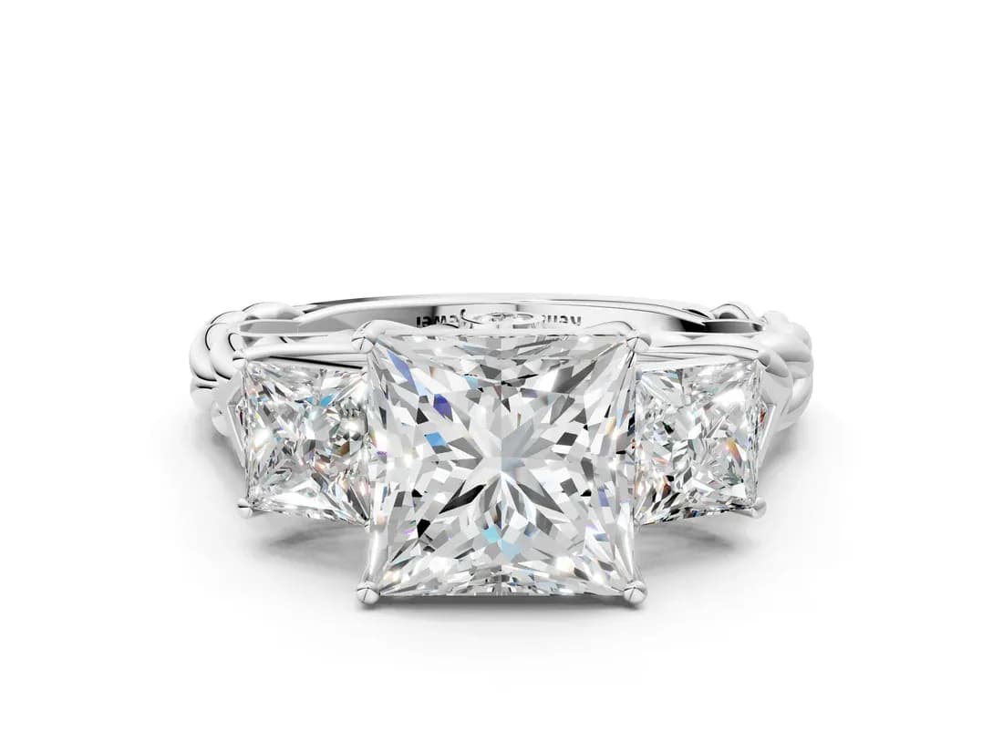 Elegant White Gold Three-Stone Princess Cut Diamond Braided Band Ring